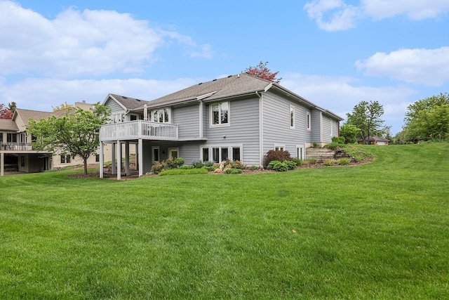 2176 Teal Ct SE, Grand Rapids, MI 49546 - rear view of property with a lawn and a deck