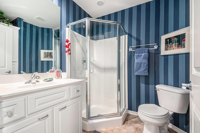 2176 Teal Ct SE, Grand Rapids, MI 49546 - full bathroom with wallpapered walls, vanity, a stall shower, toilet, and baseboards