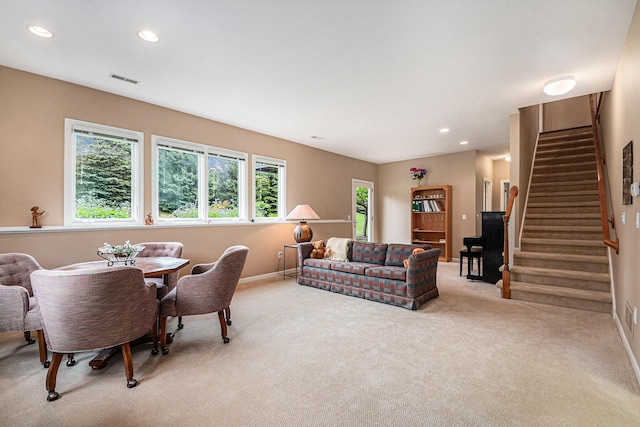 2176 Teal Ct SE, Grand Rapids, MI 49546 - living area featuring light colored carpet, stairway, baseboards, and recessed lighting