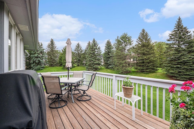 2176 Teal Ct SE, Grand Rapids, MI 49546 - deck with a lawn, outdoor dining space, and grilling area