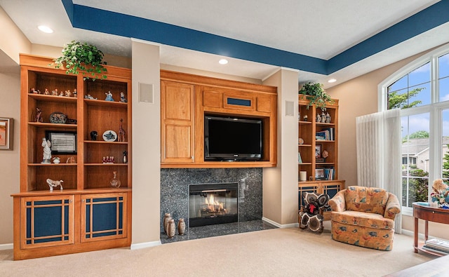 2176 Teal Ct SE, Grand Rapids, MI 49546 - carpeted living area with a premium fireplace, recessed lighting, and baseboards