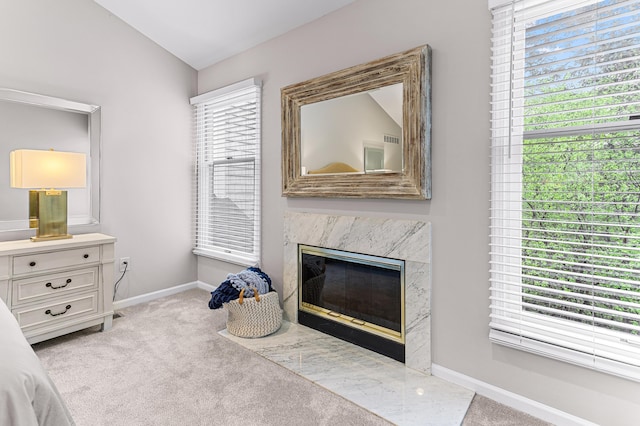 2485 Wildbrook Run Unit 154, Bloomfield Hills, MI 48304 - carpeted bedroom with baseboards and a fireplace