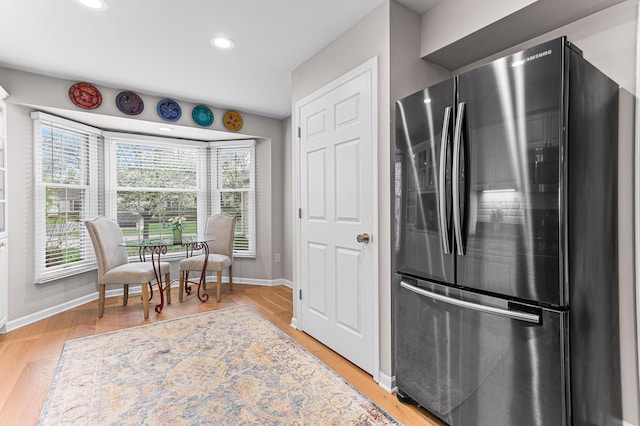 2485 Wildbrook Run Unit 154, Bloomfield Hills, MI 48304 - kitchen with freestanding refrigerator, healthy amount of natural light, baseboards, light wood-type flooring, and recessed lighting