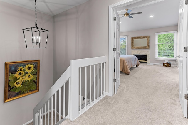 2485 Wildbrook Run Unit 154, Bloomfield Hills, MI 48304 - hall featuring an upstairs landing, carpet floors, a chandelier, baseboards, and recessed lighting