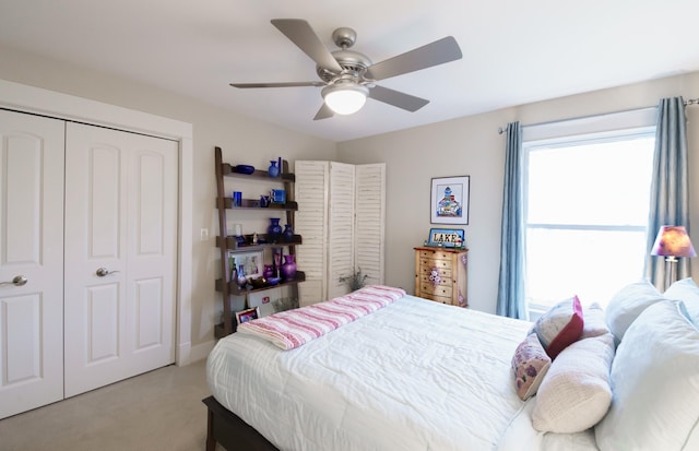 300 Morning Walk Path, Benton Harbor, MI 49022 - bedroom with light colored carpet, a closet, and ceiling fan