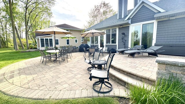 300 Morning Walk Path, Benton Harbor, MI 49022 - view of patio featuring outdoor dining area and grilling area