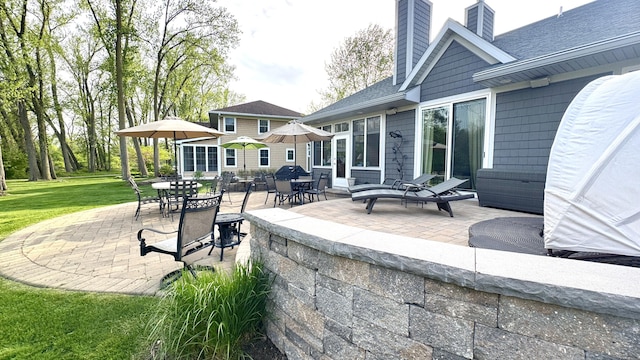 300 Morning Walk Path, Benton Harbor, MI 49022 - view of patio / terrace with outdoor dining area