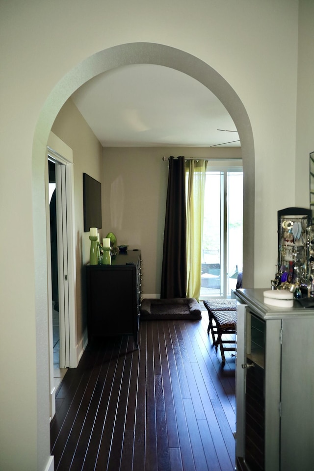 300 Morning Walk Path, Benton Harbor, MI 49022 - interior space featuring arched walkways, dark wood-type flooring, and baseboards