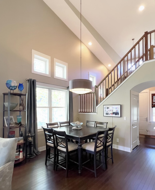 300 Morning Walk Path, Benton Harbor, MI 49022 - dining space featuring high vaulted ceiling, baseboards, dark wood finished floors, arched walkways, and recessed lighting