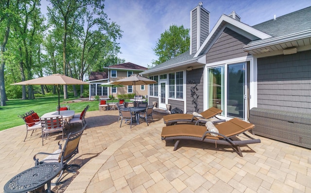 300 Morning Walk Path, Benton Harbor, MI 49022 - view of patio / terrace with outdoor dining space