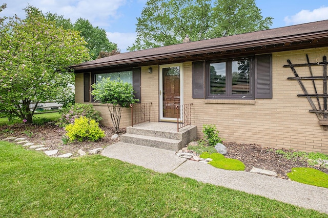 7569 Astronaut Ave, Jenison, MI 49428 - view of front facade featuring brick siding