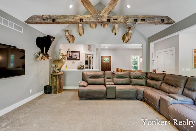 1109 Kenowa Ave SW, Byron Center, MI 49315 - living room featuring carpet flooring, recessed lighting, high vaulted ceiling, and baseboards