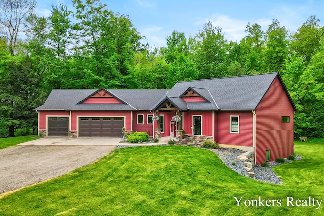 1109 Kenowa Ave SW, Byron Center, MI 49315 - view of front of house featuring driveway, a front yard, a garage, and stone siding