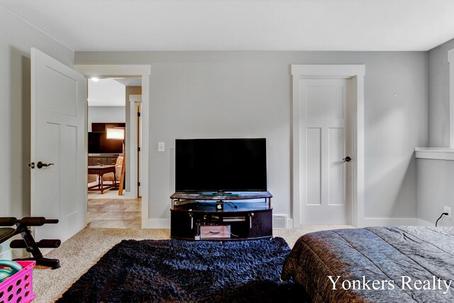 1109 Kenowa Ave SW, Byron Center, MI 49315 - bedroom featuring baseboards