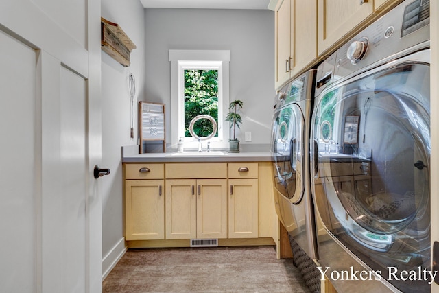 1109 Kenowa Ave SW, Byron Center, MI 49315 - laundry area with separate washer and dryer, cabinet space, and light wood-style flooring