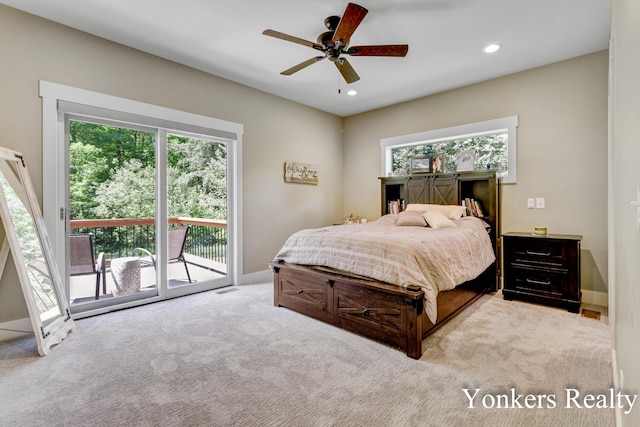 1109 Kenowa Ave SW, Byron Center, MI 49315 - bedroom featuring access to outside, multiple windows, carpet, recessed lighting, and baseboards
