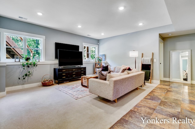 1109 Kenowa Ave SW, Byron Center, MI 49315 - living room featuring recessed lighting, baseboards, and stone finish flooring