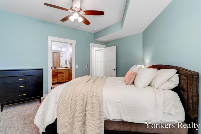 1109 Kenowa Ave SW, Byron Center, MI 49315 - carpeted bedroom with ensuite bath and ceiling fan