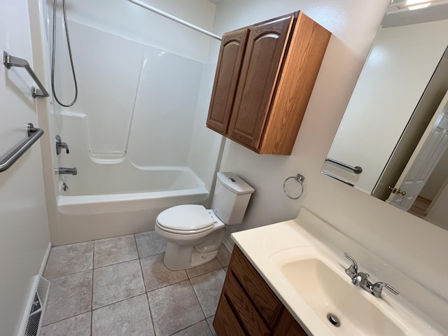 5764 W Brookwood Pl, Ludington, MI 49431 - bathroom with toilet, vanity, bathing tub / shower combination, and tile patterned floors