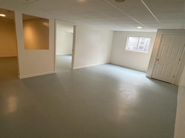 5764 W Brookwood Pl, Ludington, MI 49431 - basement with a paneled ceiling and recessed lighting