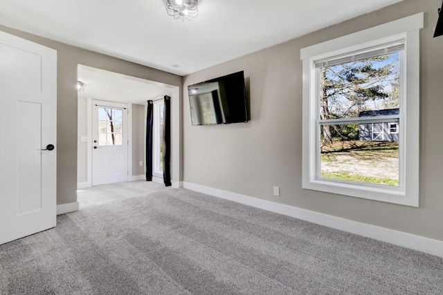 4371 N 68th Ave, Hart, MI 49420 - spare room with baseboards and light carpet