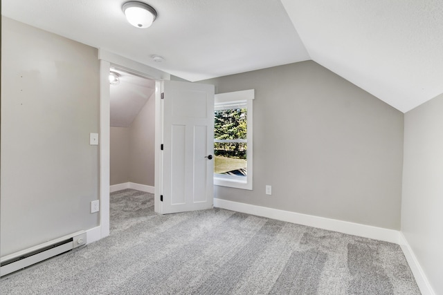 4371 N 68th Ave, Hart, MI 49420 - bonus room with a baseboard radiator, lofted ceiling, carpet floors, and baseboards