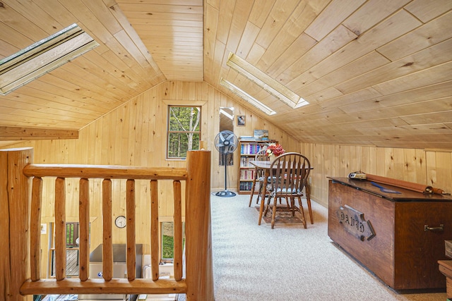 4900 N Railroad Ave, Pentwater, MI 49449 - office space with a skylight, vaulted ceiling, wood walls, wood ceiling, and carpet