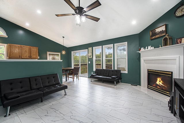 11199 W Harlow Rd, Greenville, MI 48838 - living area with lofted ceiling, light marble finish floors, a ceiling fan, plenty of natural light, and recessed lighting