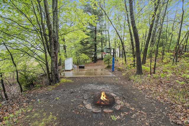 11199 W Harlow Rd, Greenville, MI 48838 - view of yard featuring an outdoor fire pit