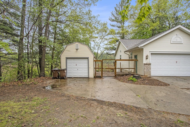 11199 W Harlow Rd, Greenville, MI 48838 - view of side of home with an outbuilding and brick siding