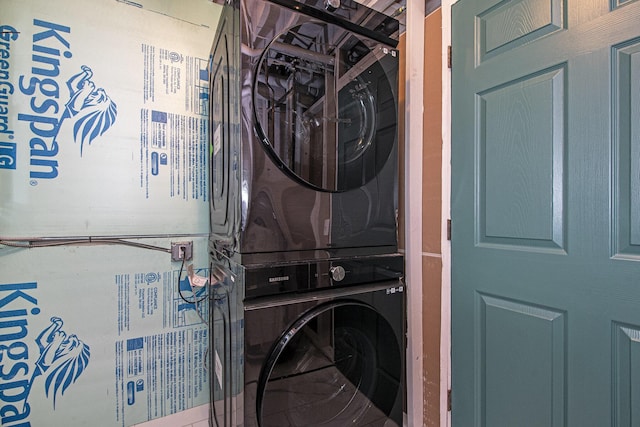 11199 W Harlow Rd, Greenville, MI 48838 - washroom featuring estacked washer and dryer