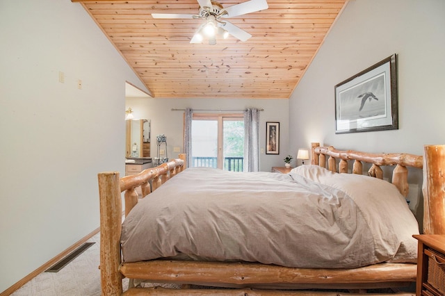6818 W Vesper Dr, Ludington, MI 49431 - bedroom with lofted ceiling, access to exterior, wood ceiling, baseboards, and carpet flooring