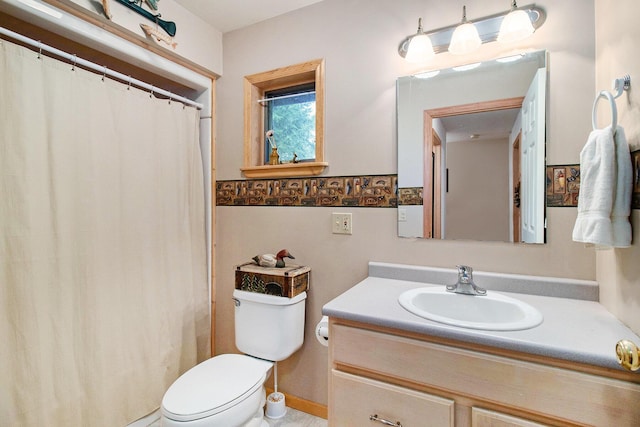 6818 W Vesper Dr, Ludington, MI 49431 - full bath with vanity, toilet, and curtained shower