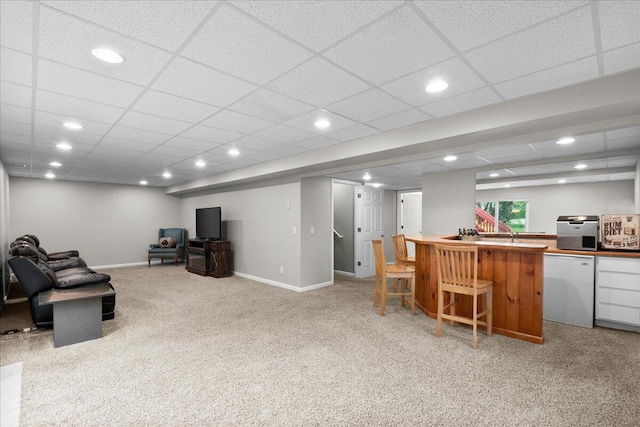 306 Meister Rd, Fremont, MI 49412 - carpeted living area with baseboards, a bar, and recessed lighting