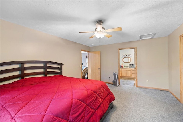65 N Brown Rd, Bailey, MI 49303 - carpeted bedroom featuring baseboards, ensuite bathroom, and attic access