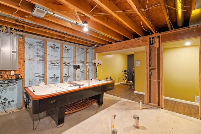 65 N Brown Rd, Bailey, MI 49303 - rec room featuring electric panel and baseboards