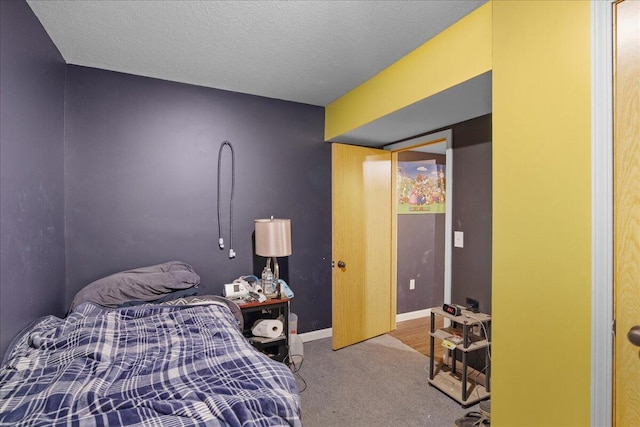 65 N Brown Rd, Bailey, MI 49303 - bedroom featuring carpet, baseboards, and a textured ceiling