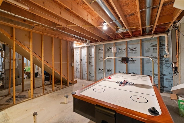 65 N Brown Rd, Bailey, MI 49303 - unfinished below grade area with heating unit