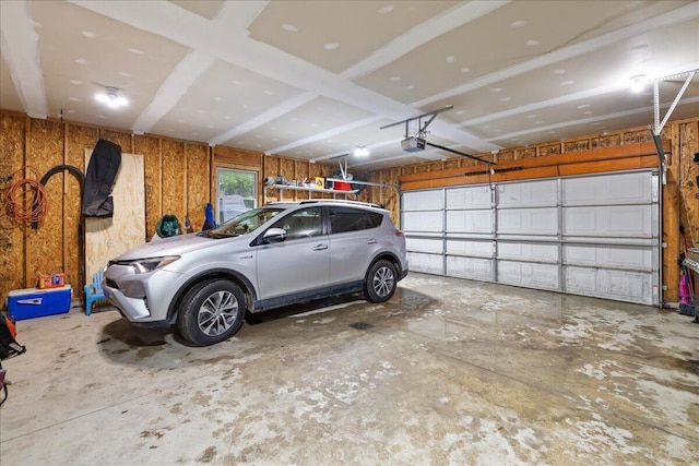 65 N Brown Rd, Bailey, MI 49303 - garage with a garage door opener