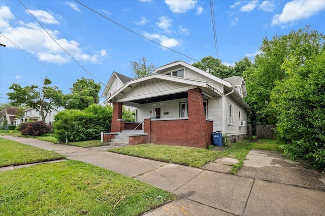 1019 Second St NW, Grand Rapids, MI 49504 - bungalow with covered porch and brick siding