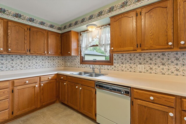 70594 Dennis Dr, Niles, MI 49120 - kitchen featuring dishwasher, brown cabinetry, and light countertops