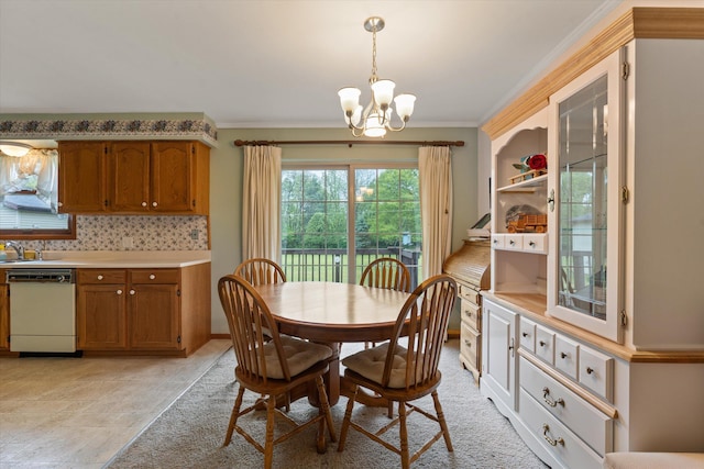 70594 Dennis Dr, Niles, MI 49120 - dining space featuring a chandelier and ornamental molding