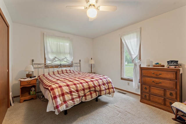 70594 Dennis Dr, Niles, MI 49120 - bedroom featuring carpet floors, a ceiling fan, baseboards, and a closet