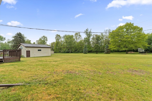70594 Dennis Dr, Niles, MI 49120 - view of green lawn with a deck