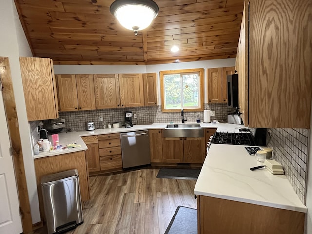 550 E N St, Edmore, MI 48829 - kitchen featuring dishwasher, a sink, wood ceiling, gas stove, and light wood-style flooring