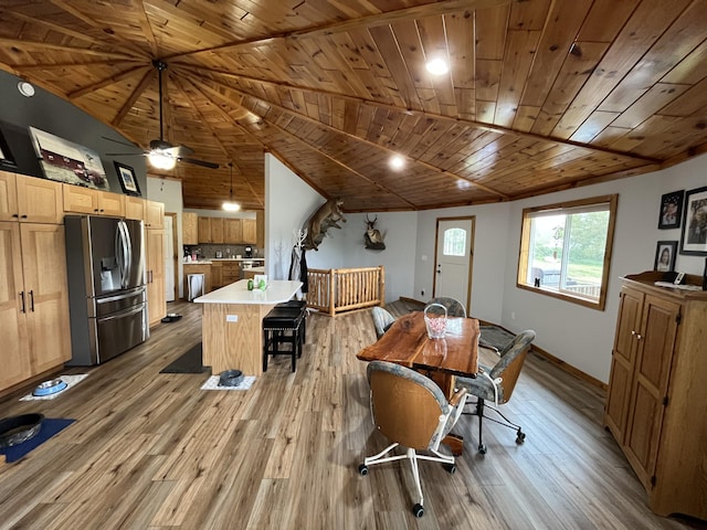 550 E N St, Edmore, MI 48829 - dining room with wooden ceiling, light wood-type flooring, baseboards, vaulted ceiling, and ceiling fan