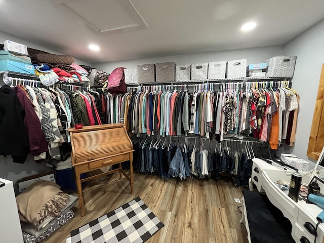 550 E N St, Edmore, MI 48829 - spacious closet featuring attic access and wood finished floors