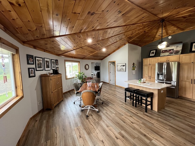 550 E N St, Edmore, MI 48829 - dining space with wood ceiling, wood finished floors, baseboards, and a ceiling fan