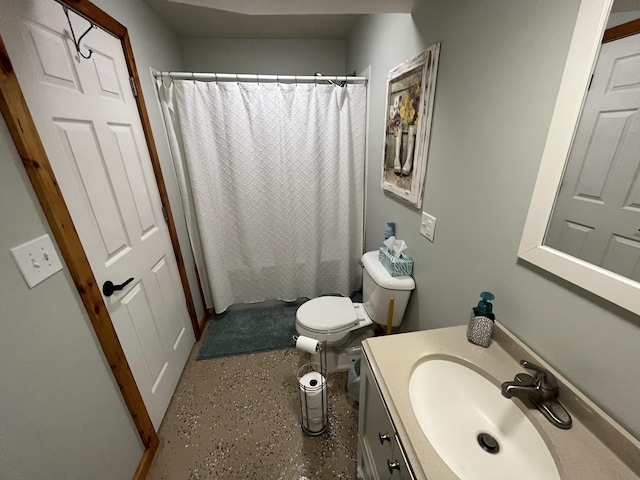 550 E N St, Edmore, MI 48829 - bathroom featuring vanity and toilet