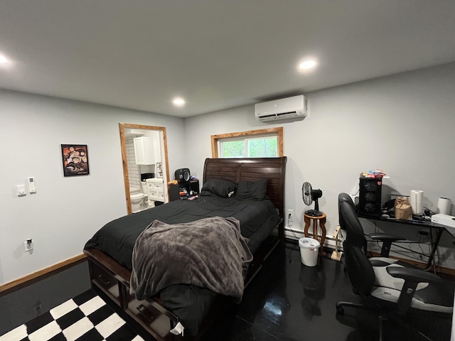 550 E N St, Edmore, MI 48829 - bedroom with a wall mounted air conditioner, an office area, recessed lighting, ensuite bathroom, and baseboards